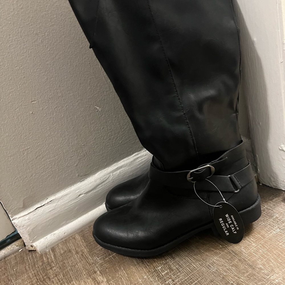 Size 7 wide Calf Black Boots.